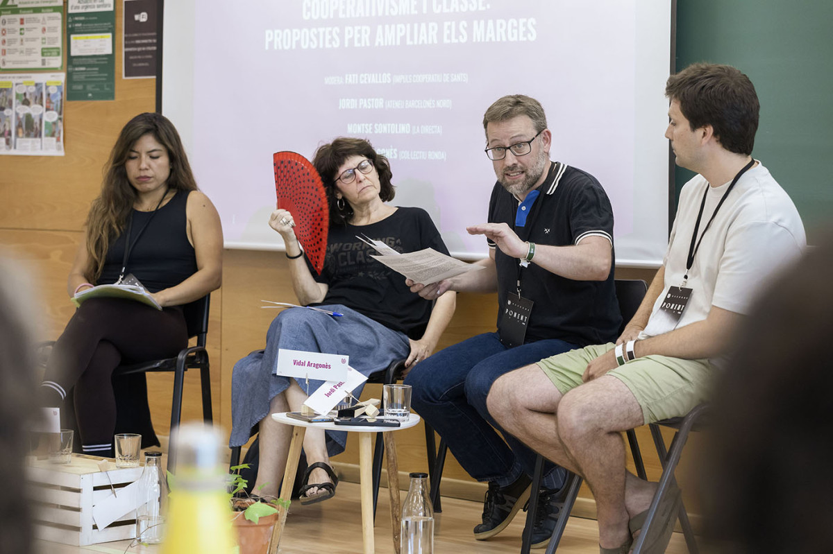 Fati Cevallos, Montse Santolino, Vidal Aragonès i Jordi Pastor, a l'acte de la UESCOOP