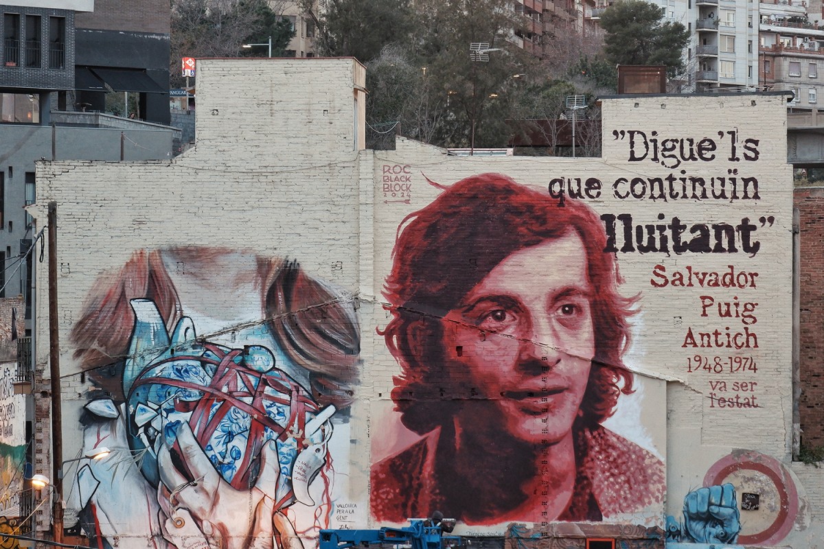 Mural en record de Salvador Puig Antich que Roc Blackblock ha pintat aquesta setmana en una paret de Vallcarca en el marc del seu projecte «Murs de Bitàcola»